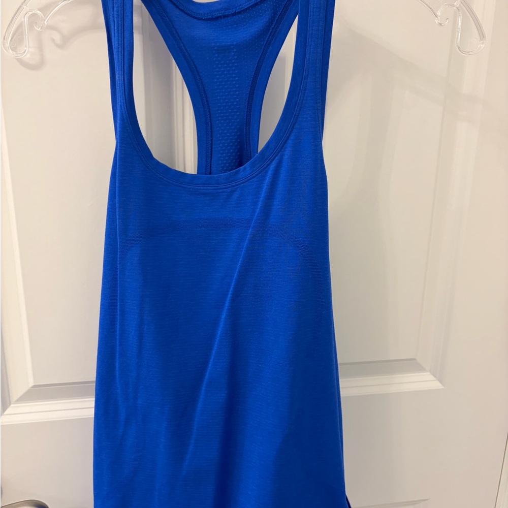 lululemon athletica Royal Blue Racerback Tank
Swiftly hip length